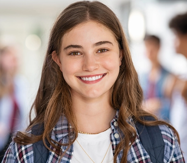 Middle School Girl smiling at the camera